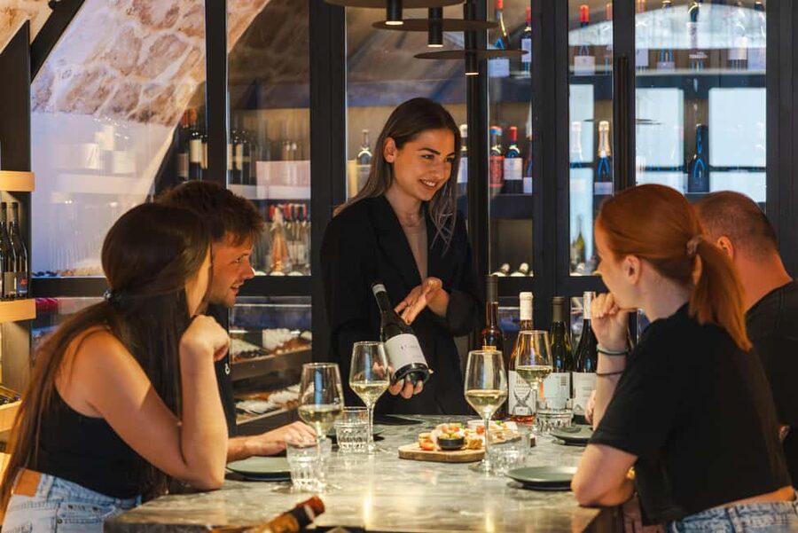 Rethymno: Cretan Wine Tasting Guided Tour with Local Food - Inside a 19th-century wine cellar