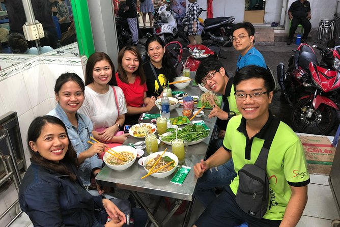 Saigon By Night and Street Food By Motorbike | Opt: Ao Dai Riders - Nguyen Trai Street and the city in motion
