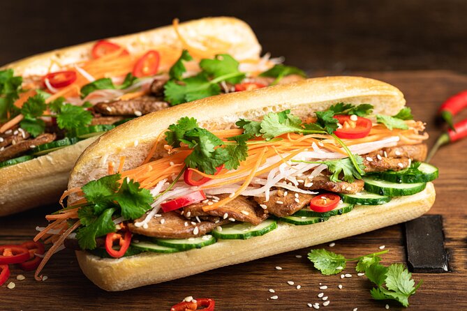 Saigon By Night and Vietnam Local Food on Motorbike - Starting with banh mi at 18:00