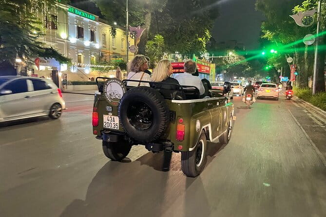 Saigon By Night Open Air Jeep Street Food Tour Experience - Riding through Ho Chi Minh City in an open-air army Jeep