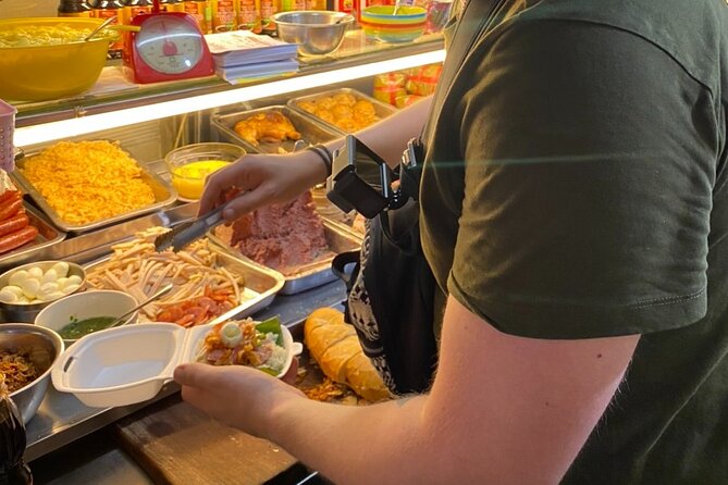 Saigon by Night: Private Street Food Walk You Can’t Miss - An evening walk through local neighborhoods