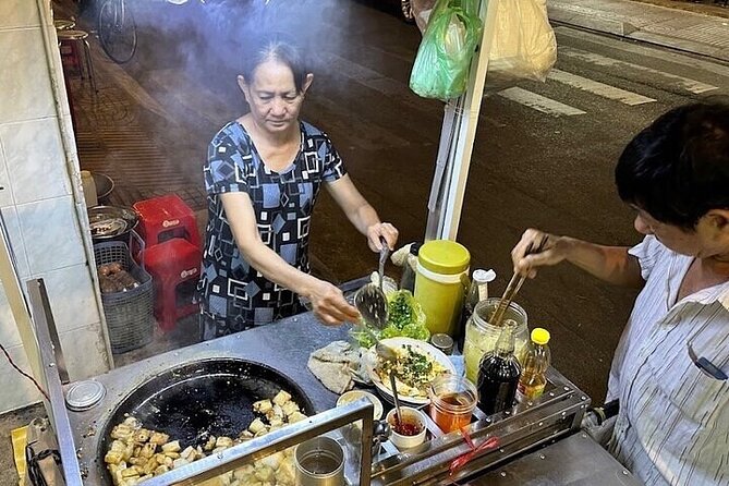 Saigon Evening Walking Street Food Tour - Stop Three: Pancakes, Bánh Mì, and Filled Rice Rolls