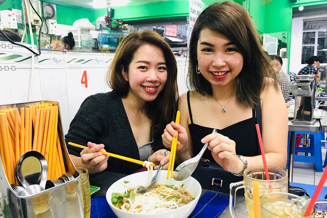 Saigon Night Scooter Experience And Local Food - Hue noodle soup, one meal, and two drinks