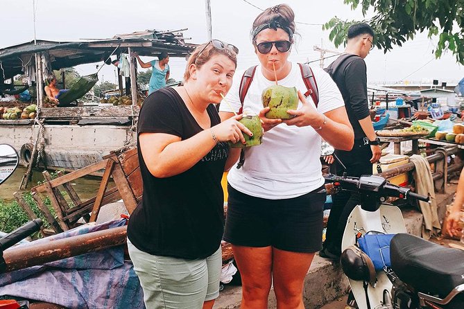 Saigon Night Sights & Local Food by Motorbike| Opt: Ao Dai Riders - District 4, the floating market, and tropical drinks