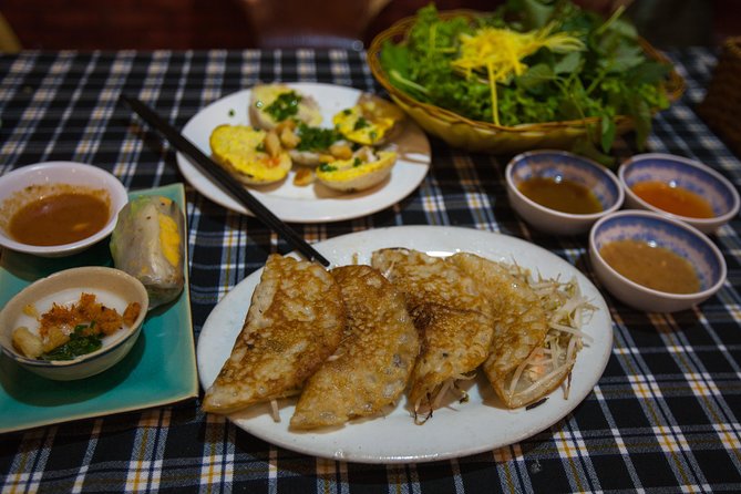 Saigon Night Street Food and City Tour on Scooter - Vietnamese pancakes after the first ride