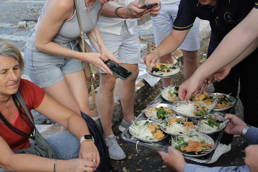 Saigon: Street Food Discovery & Local Culinary Journey - Sweet grilled banana with coconut sauce