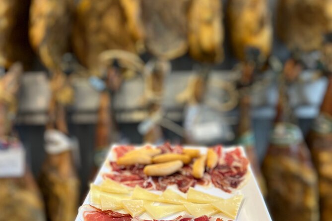 San Sebastian Pintxo Food, Wine & Market Foodie Tour(Small Group) - A classic bar, dessert, and local liqueur