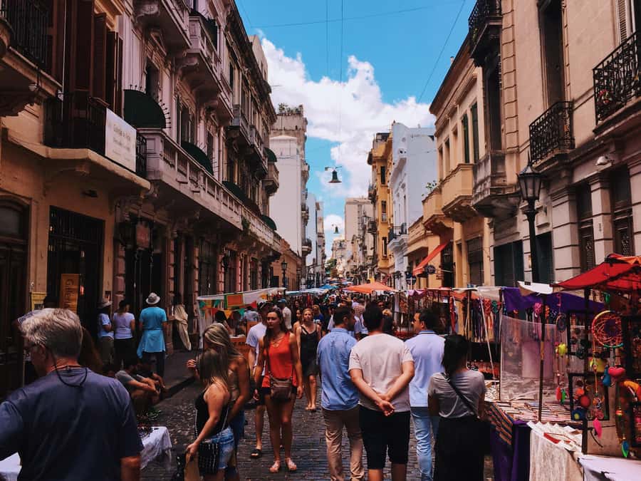 San Telmo: Historical Guided Tour with Street Food & Drinks - The walking tour, from cobblestones to city stories