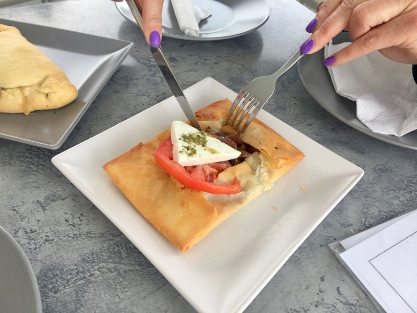 Santorini: Sunset Walking Tour with Local Food and Drinks - Wine, a seasonal dish, and the best sunset timing