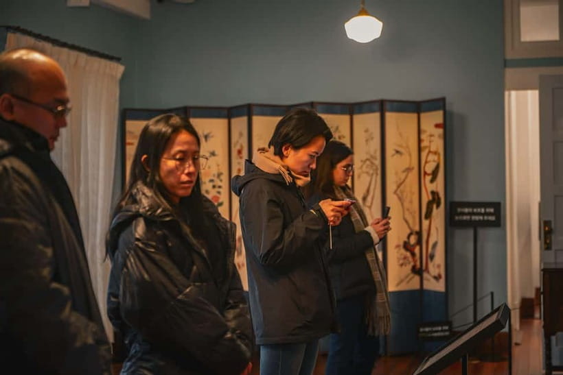Seoul: Colonial History Tour with Prison&Palace, Market Food - Seoul City Hall and the walk toward Sungnyemun