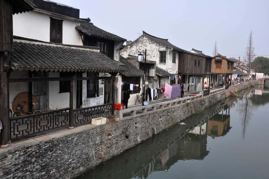 Shanghai: Xinchang Ancient Town Tour & Dumpling Class - Walking Xinchang’s Stone-Paved Lanes