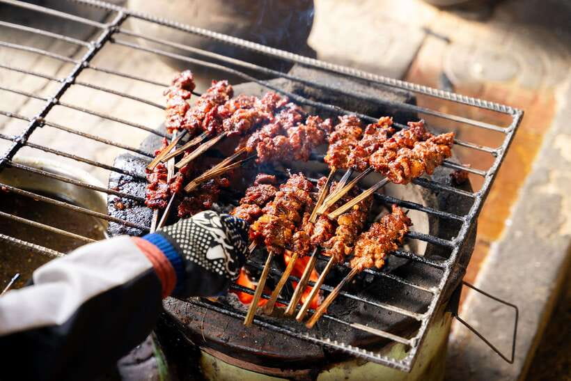 Siem Reap's Ultimate Street Food Tour by Tuk Tuk - Road 60 and the food market