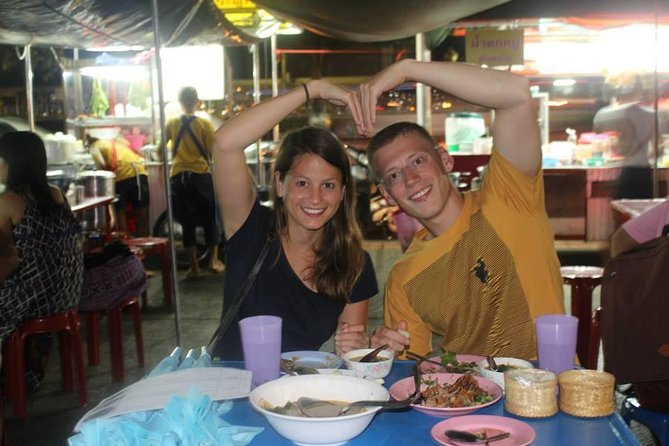 Small-Group Chiang Mai Evening Street Food Tour - Riding a songthaew through Chiang Mai