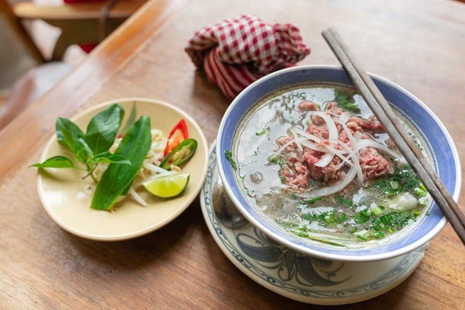 Small group Hanoi Street Food Tour with visit Train Street - Group size, walking, and timing