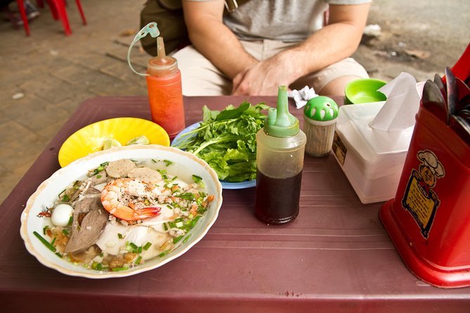 Small-group Street Food Lover by Motorbike (04 hours) - Spending 90 minutes around Ho Thi Ky Flower Market