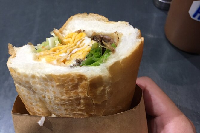 Street food on foot with a local-Asian Promise - Alex’s role goes beyond ordering food