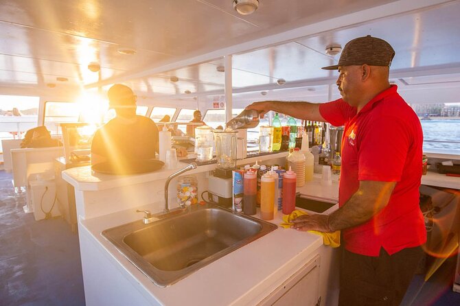 Sunset Sail Tour with Local Food - Open drinks, shaded seating, and the party upstairs