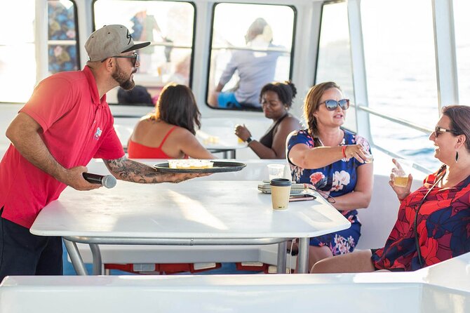 Sunset Sail Tour with Local Food - Pelican Rock and Lover’s Beach from the water