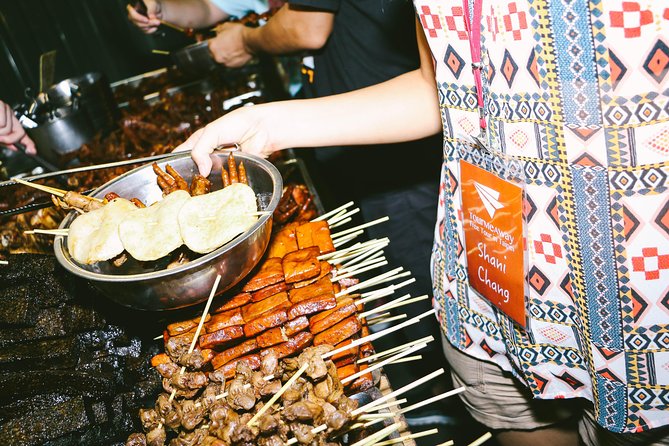 Taipei Food Tour: Night Market & Convenience Store(Food Included) - Huaxi Street Night Market: Michelin recognition and bolder choices