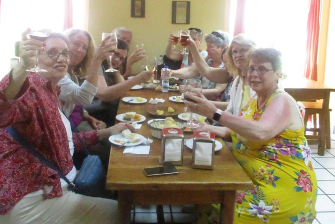 Tapas and history tour ending with churros with chocolate - Garlic prawns and local plates in the Austrias