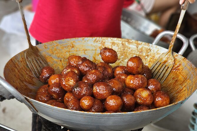 TASTE OF HANOI - walking street food adventure - Passing Dong Xuan Market without turning the tour into a market visit