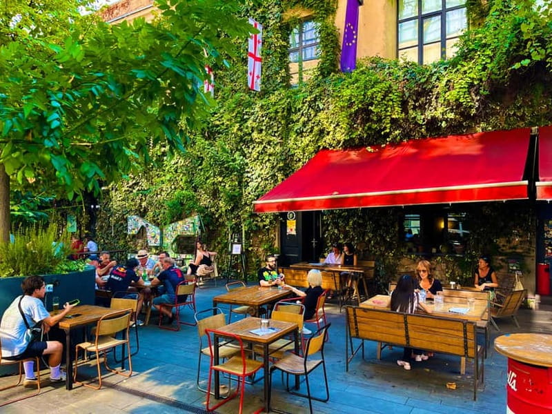 Tbilisi: Left Bank Alternative Street Food Tour with Drinks - Starting with Georgian food in a less touristy district