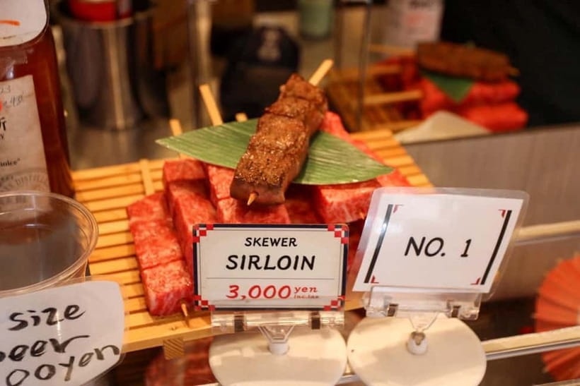 Tokyo: Private Tsukiji Street Food & Sake with Local Guide - Four pours and scallops to finish