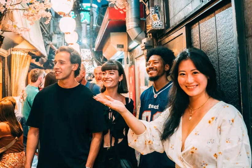 Tokyo: Shinjuku Local Eats, Street Food Tour & Culture Walk - Meeting near Uniqlo and entering Shinjuku’s backstreets