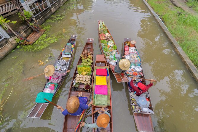 Train & Floating Market Food Adventure + Scenic train ride - Damnoen Saduak by boat, fruit, and market snacks