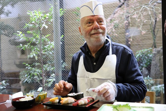 Tsukiji Fish Market Guided Tour and Sushi Making with Pro Chef - The sushi class in a traditional building