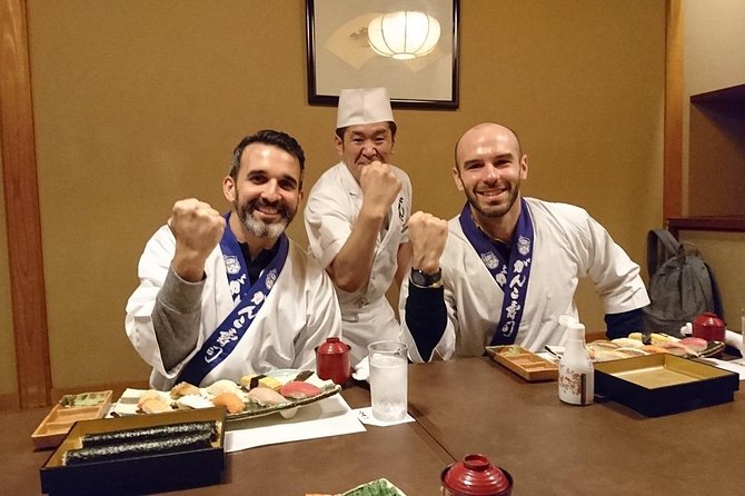 Tsukiji Fish Market Guided Tour and Sushi Making with Pro Chef - Walking through the outer Tsukiji market