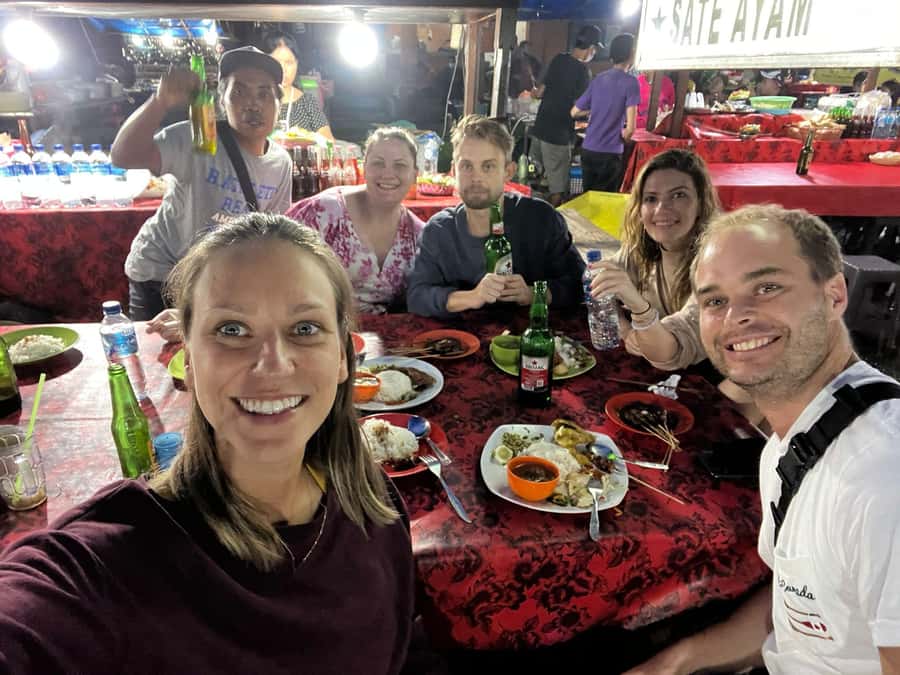 Ubud Traditional Night Market Food Tour-All Inclusive - Walking through the market with a local guide