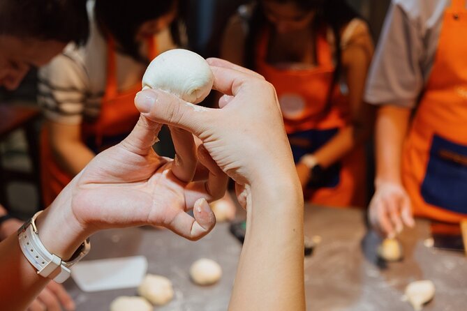 Vietnamese Bread & Brew: Banh Mi Baking Class & Specialty Coffee - Sitting down to eat what you made