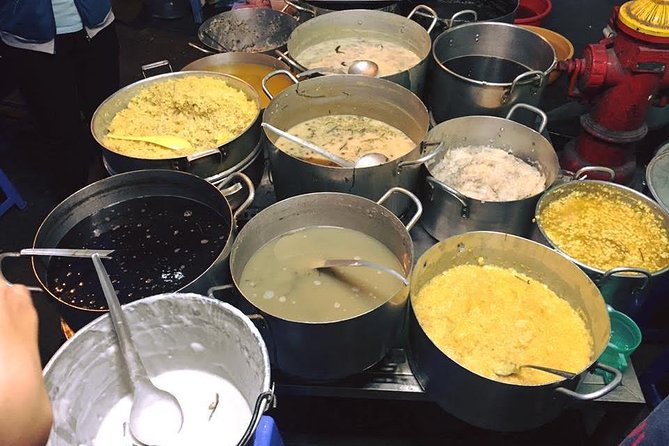 Walking street food tour - First stop: steamed cakes on Hue’s food street