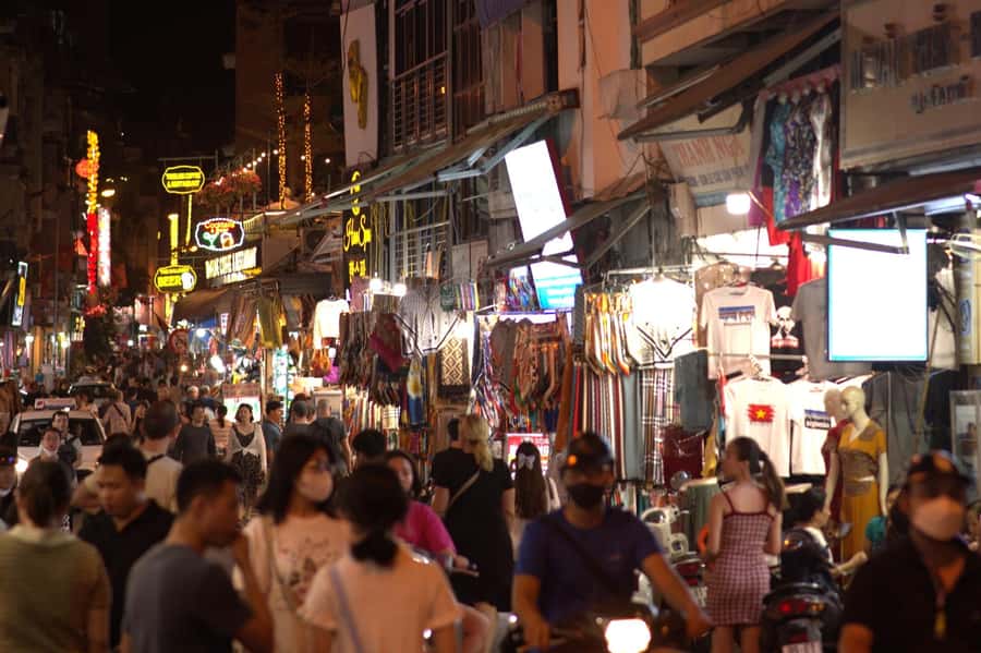Weekend Hanoi Night Market & Street Food Tour - Walking Hanoi after dark